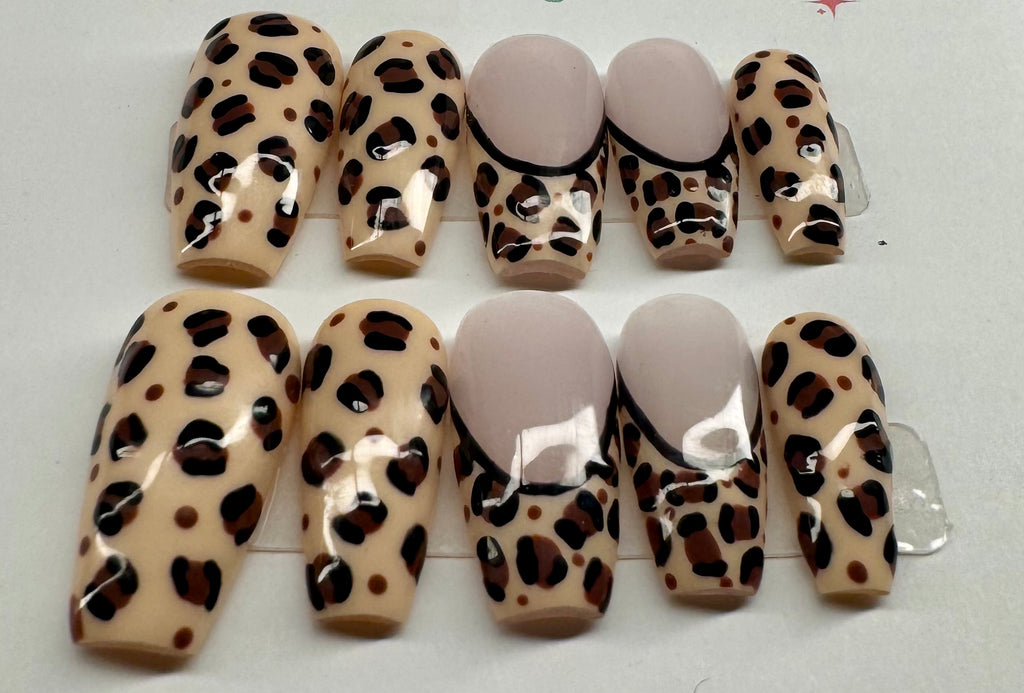 Set of leopard print nail wraps on a white background