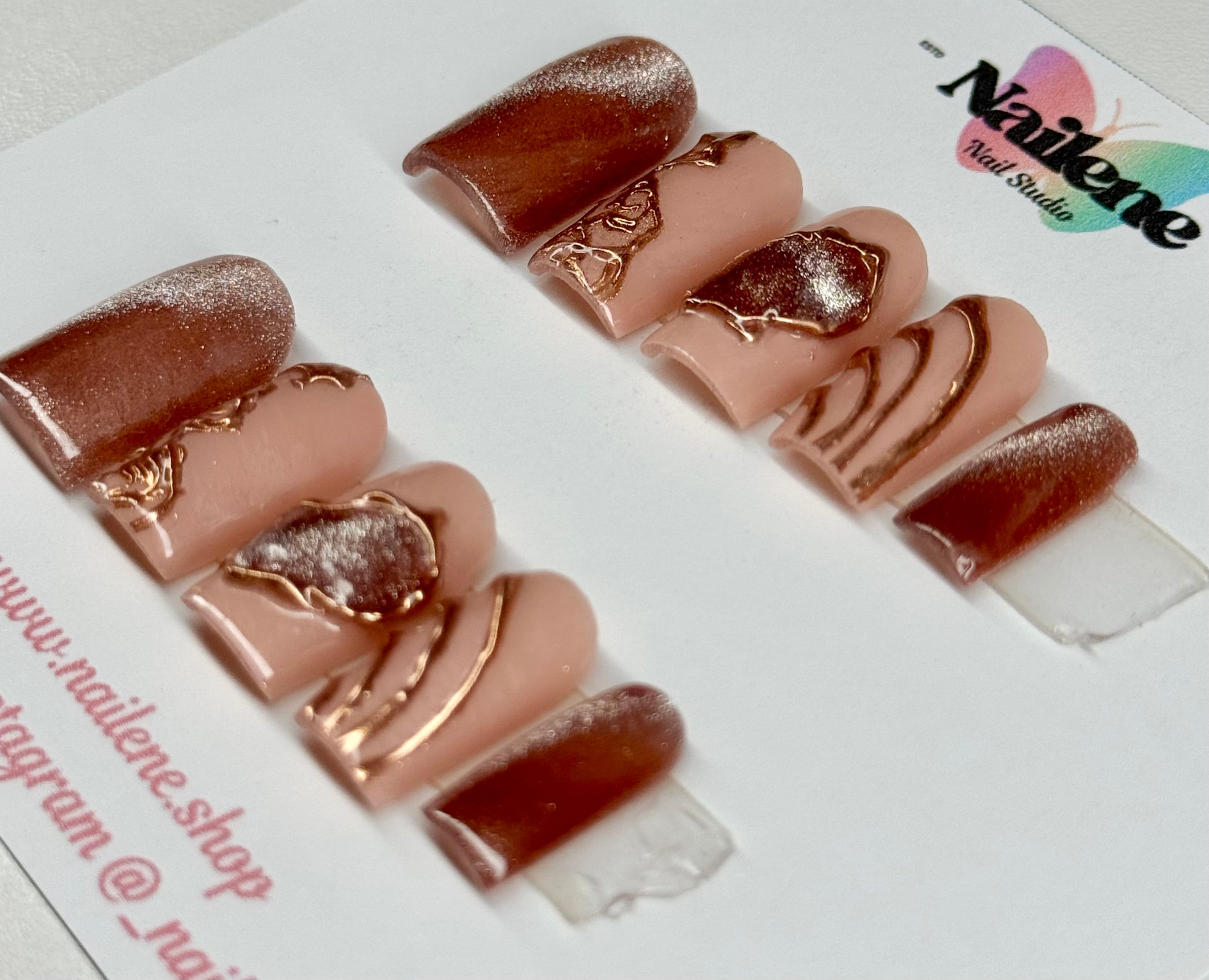 Set of nail art designs on a white background with 'Nailene' branding.