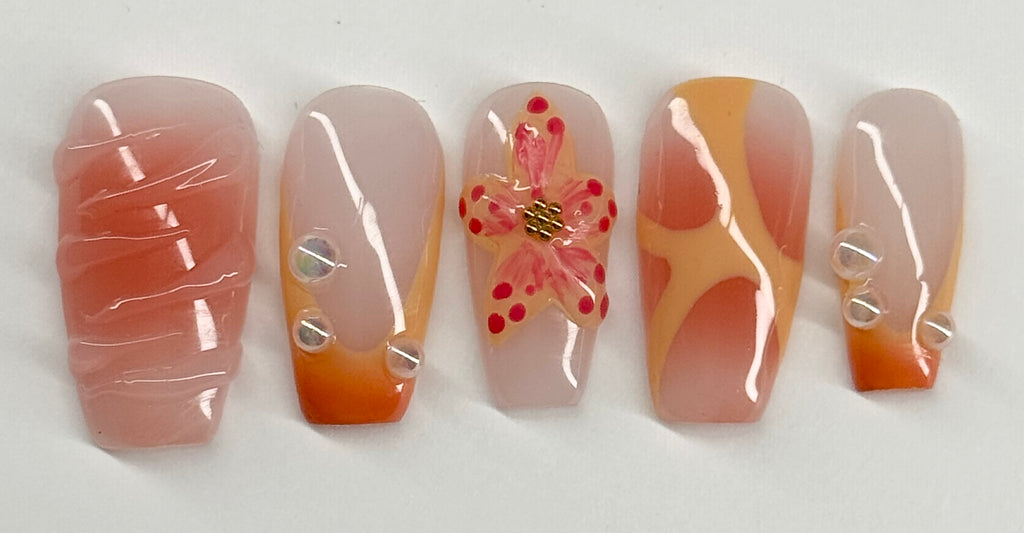 Set of five nail art designs on a white background