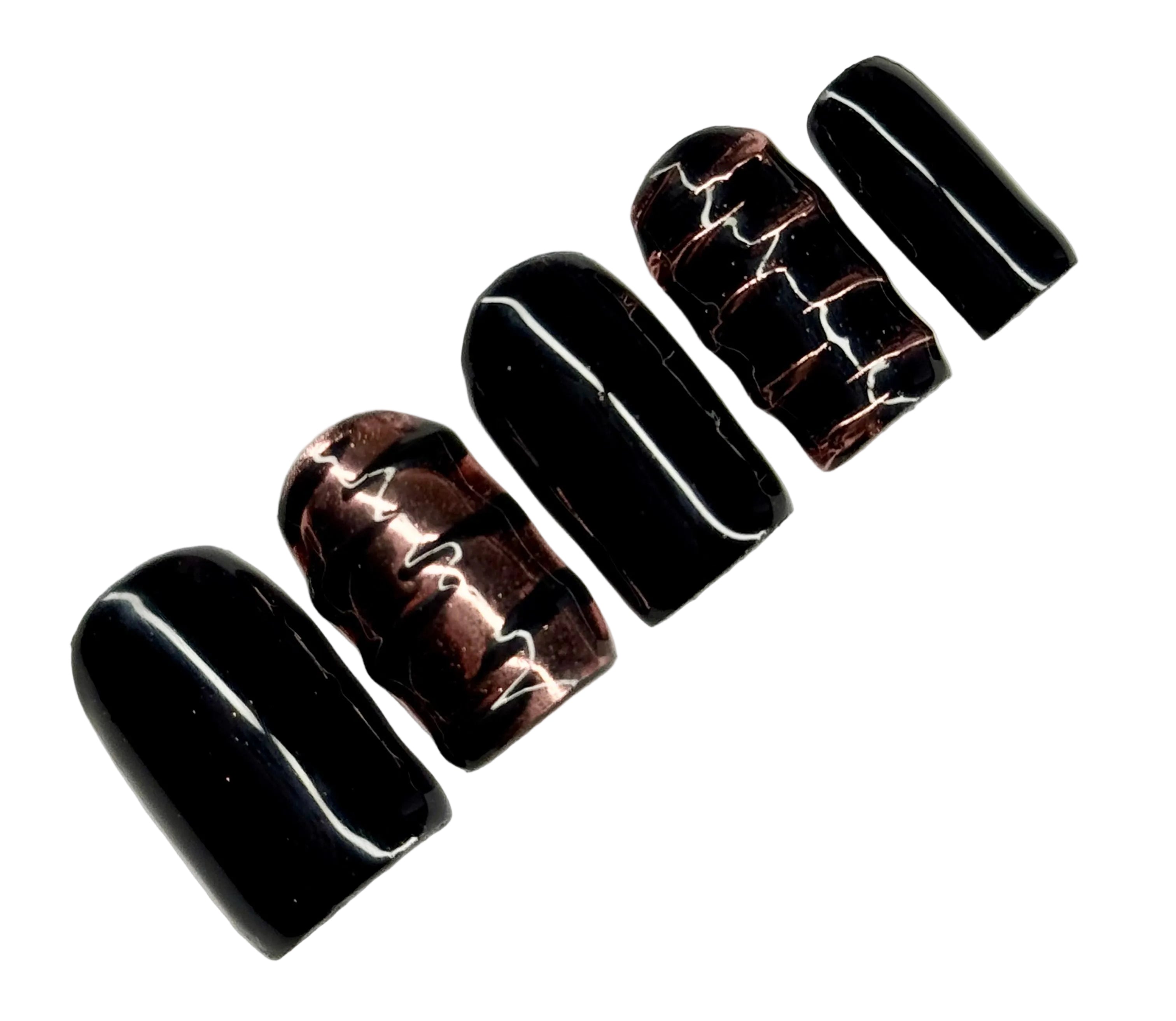 Black marbled nail art design on a white background