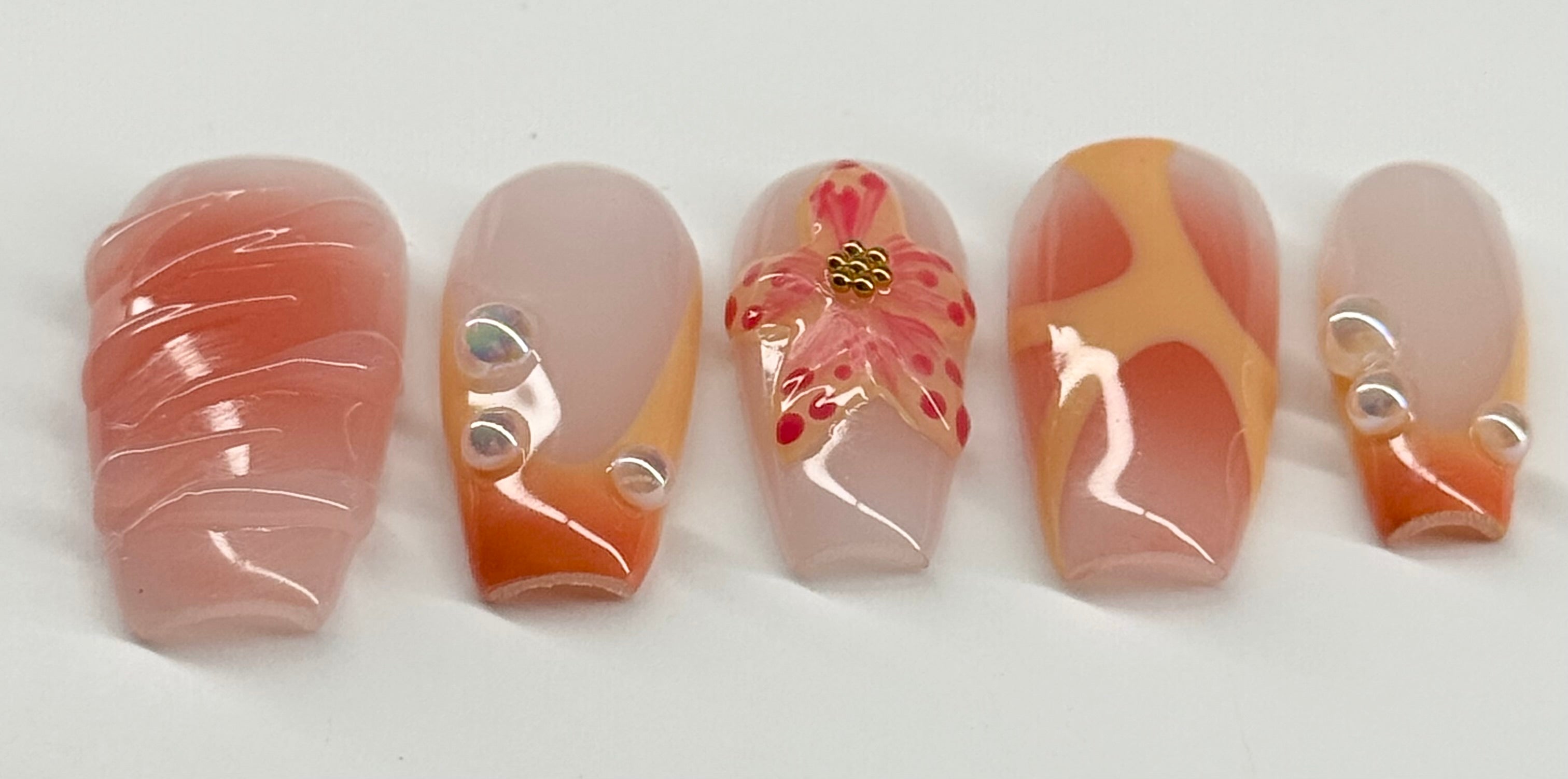 Set of six nail art designs on a white background