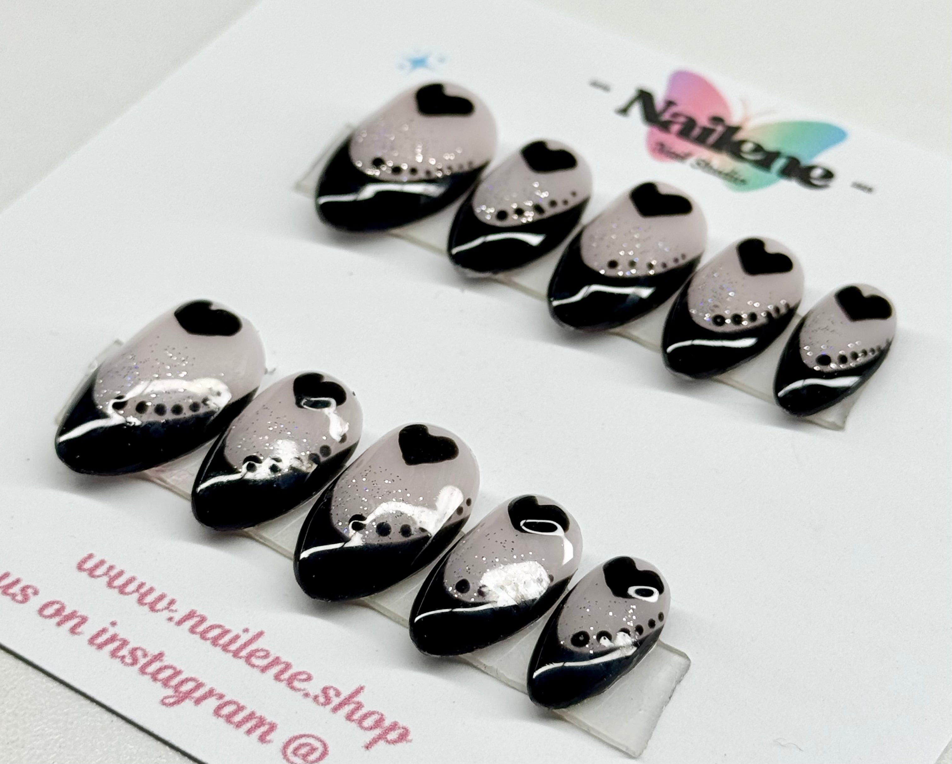 Black and silver nail art tips on a white background with 'Nailene' branding.