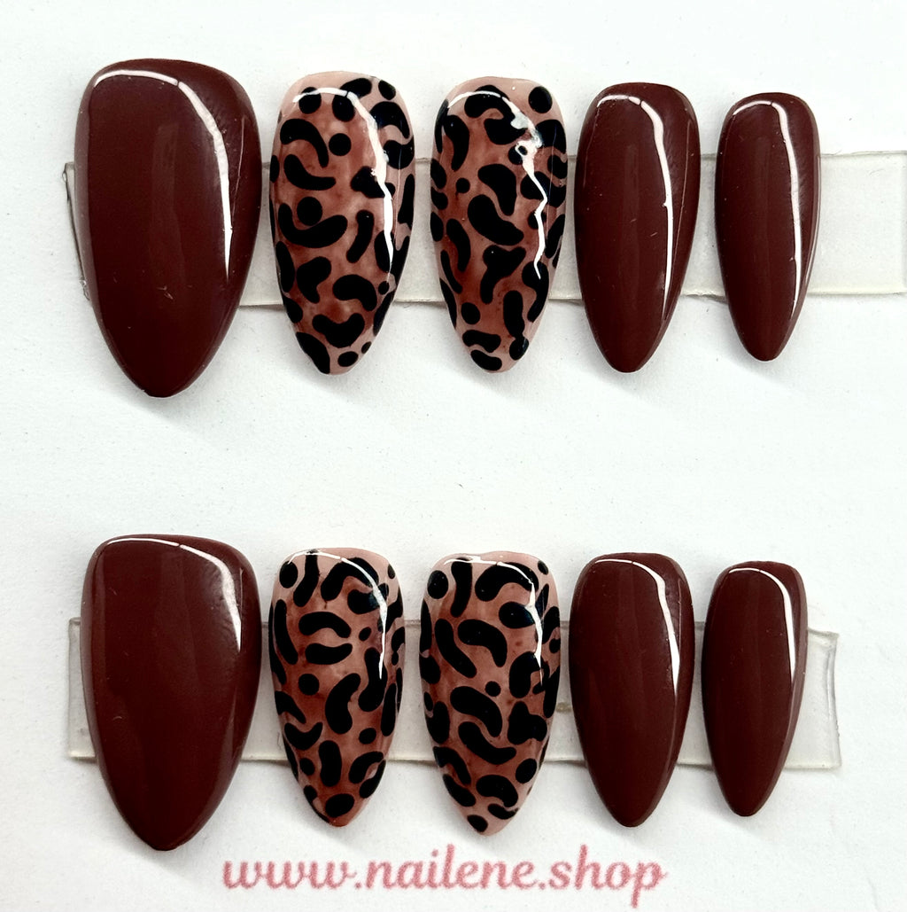 Set of brown and leopard print nail art designs on a white background with 'www.nailene.shop' branding.