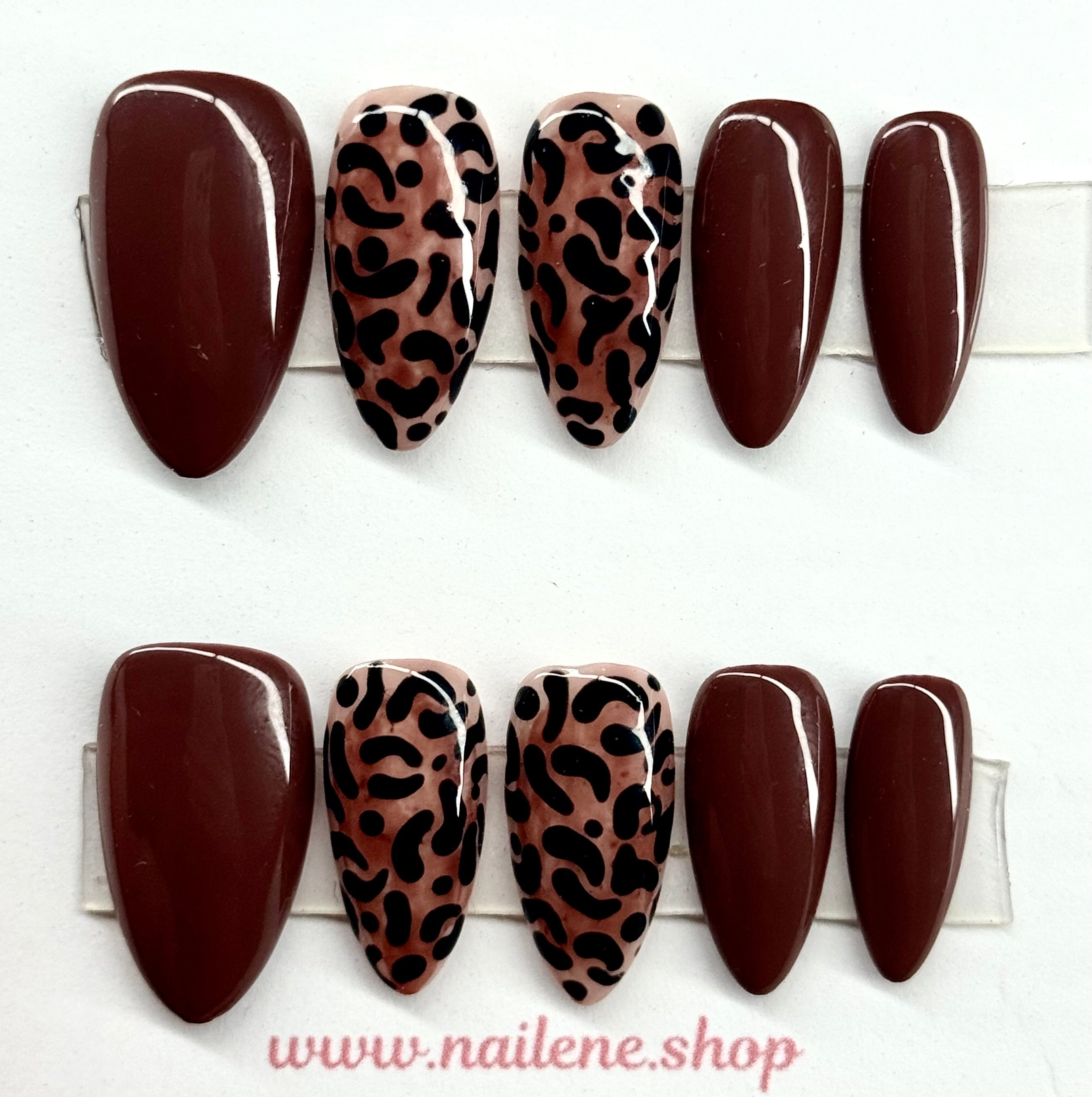 Set of brown and leopard print nail art designs on a white background with 'www.nailene.shop' branding.
