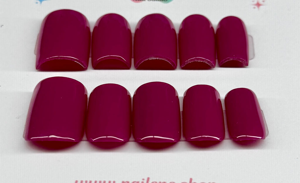 Set of plum solid nail on a white background