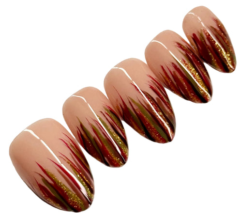 Set of long, almond-shaped nails with a gradient design on a white background