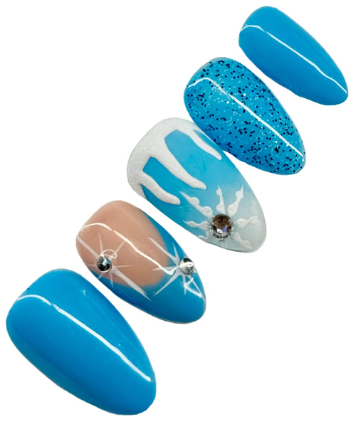 Set of blue and multicolored nail designs on a white background