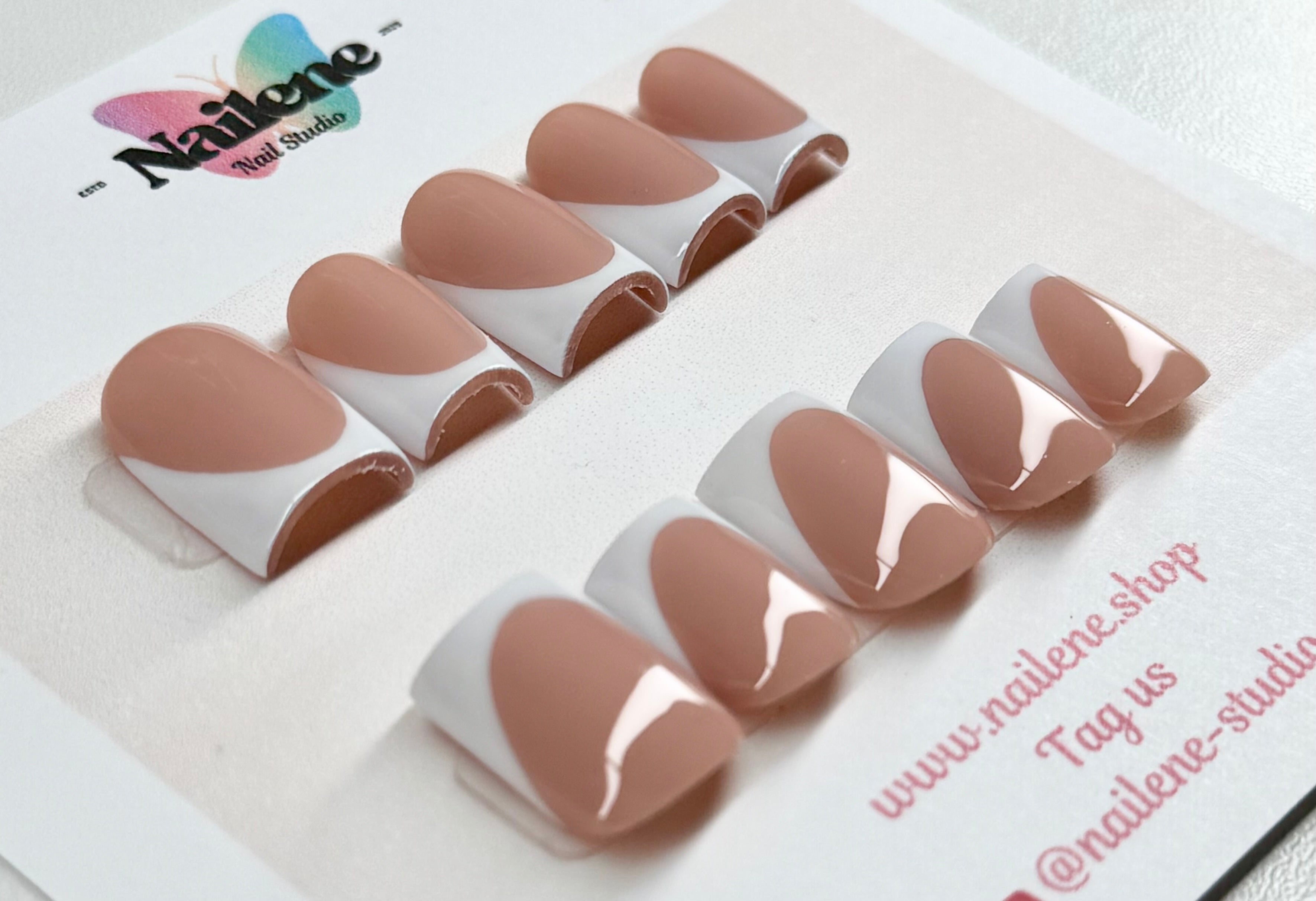 Set of false nails displayed on a Nailene branded card.