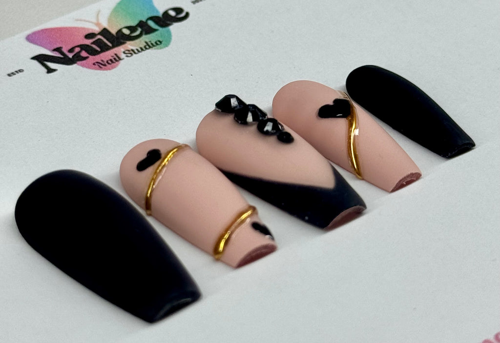 Set of nail art designs with black, gold, and pink on a white background with 'Nailene' branding.