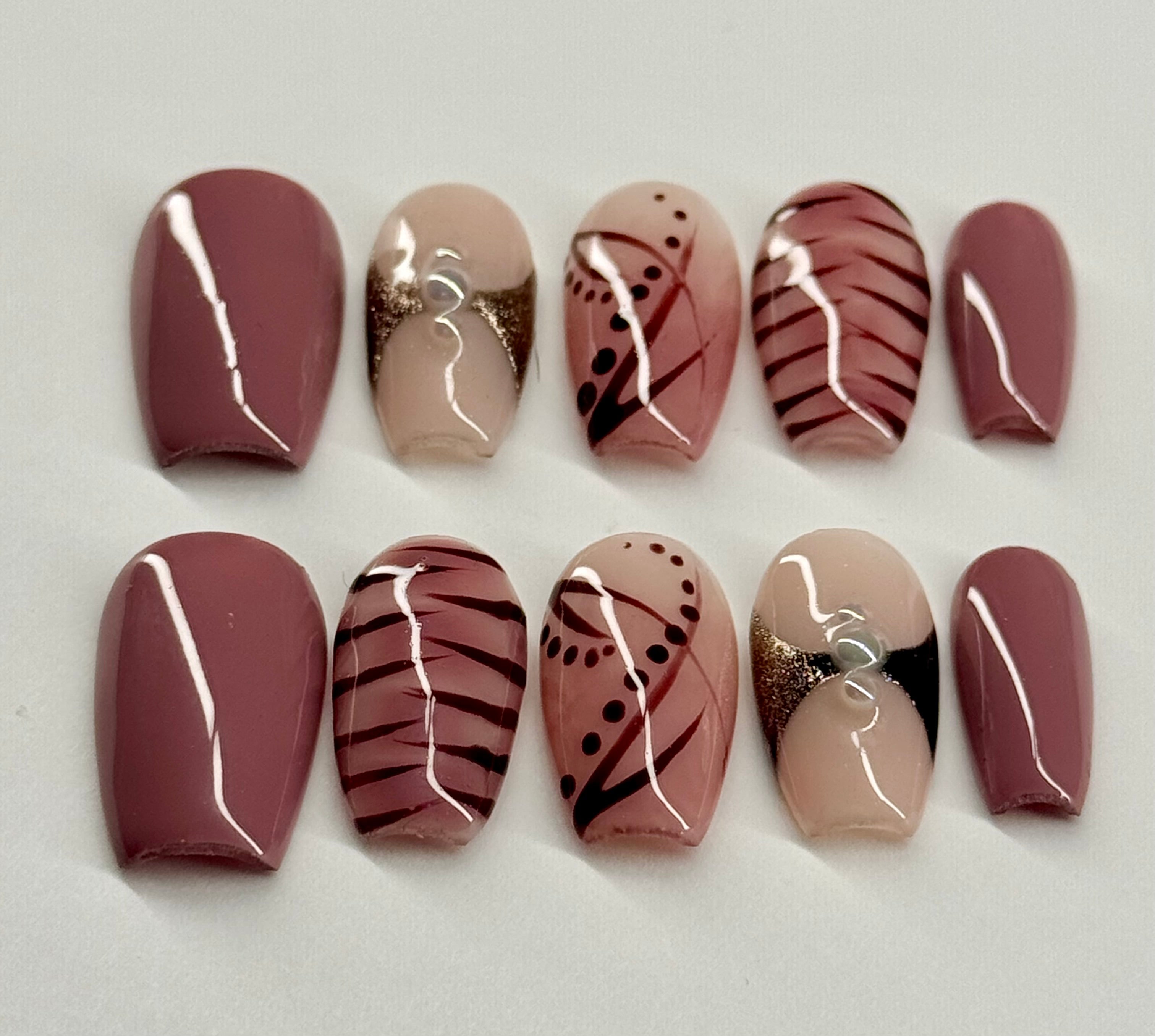 Set of nail art designs on a white background